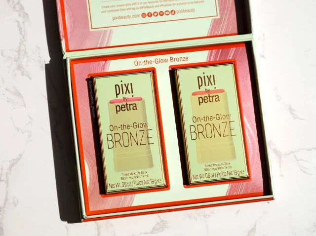 Pixi  On the Glow bronze -  ( warm Glow pink  bronze blush ) and Rich Glow - 1 blush 1 bronzer set Glamour Glow